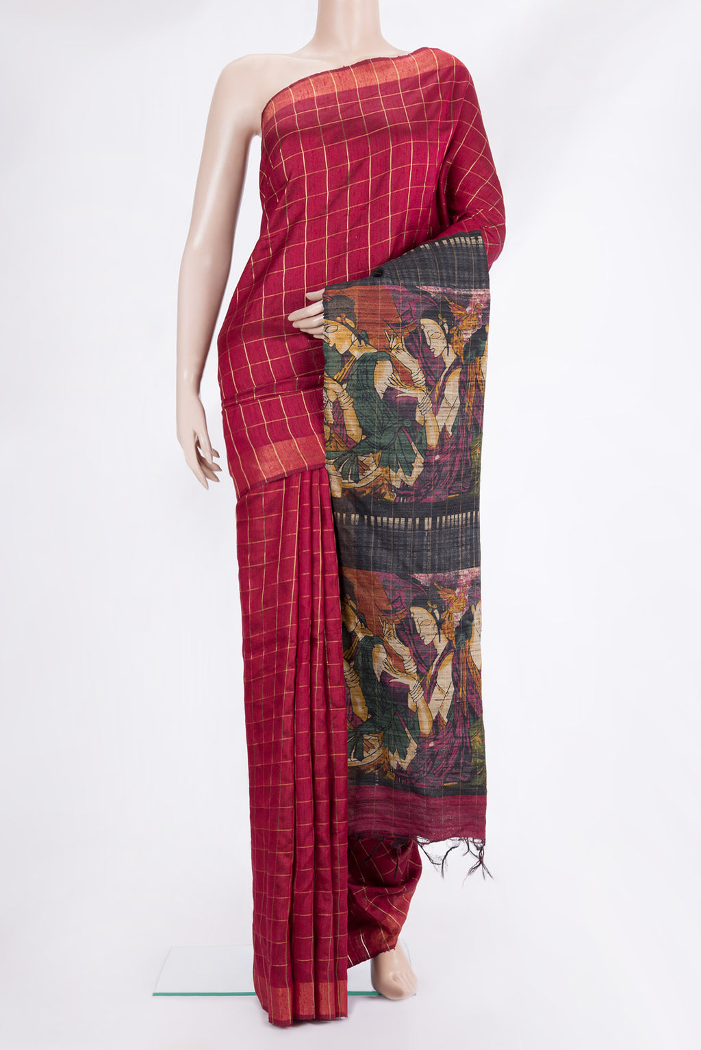 Maroon Tussar Saree with Checked design on the body and Zari Border.  displayed on a mannequin