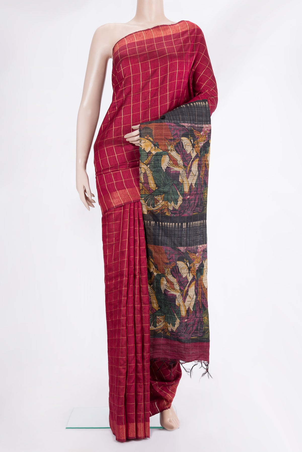 Maroon Tussar Saree with Checked design on the body and Zari Border.  displayed on a mannequin