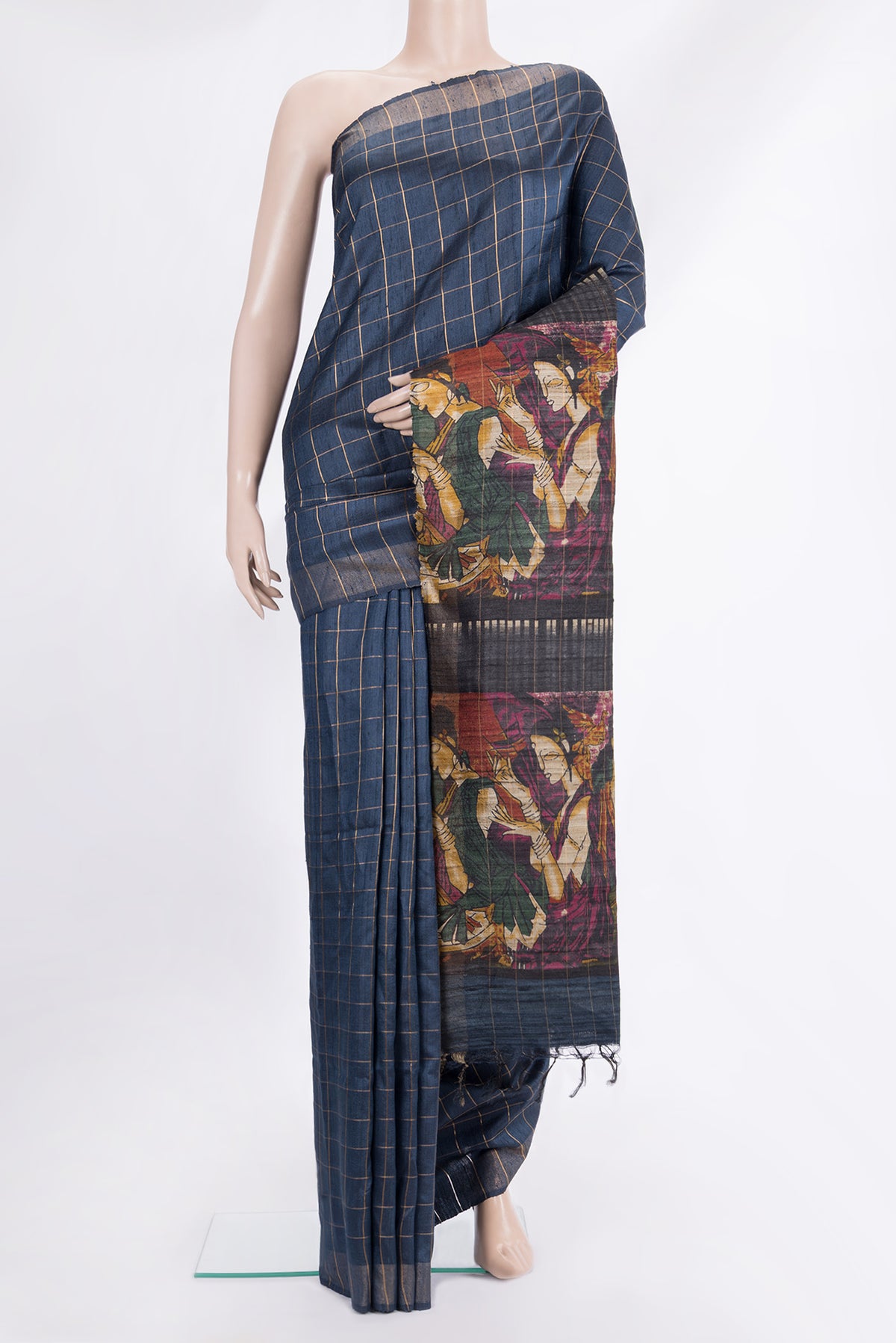 Blue Grey Tussar Saree with Checked design on the body and Zari Border.  displayed on a mannequin