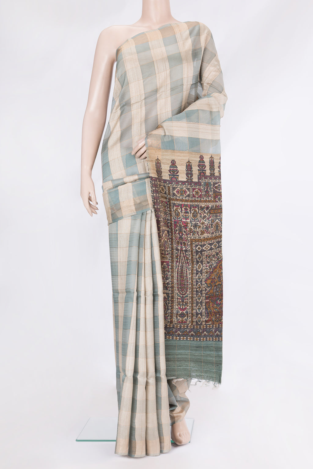 Multi Color Tussar Silk Saree with Checked design on the body and Zari Border.  displayed on a mannequin