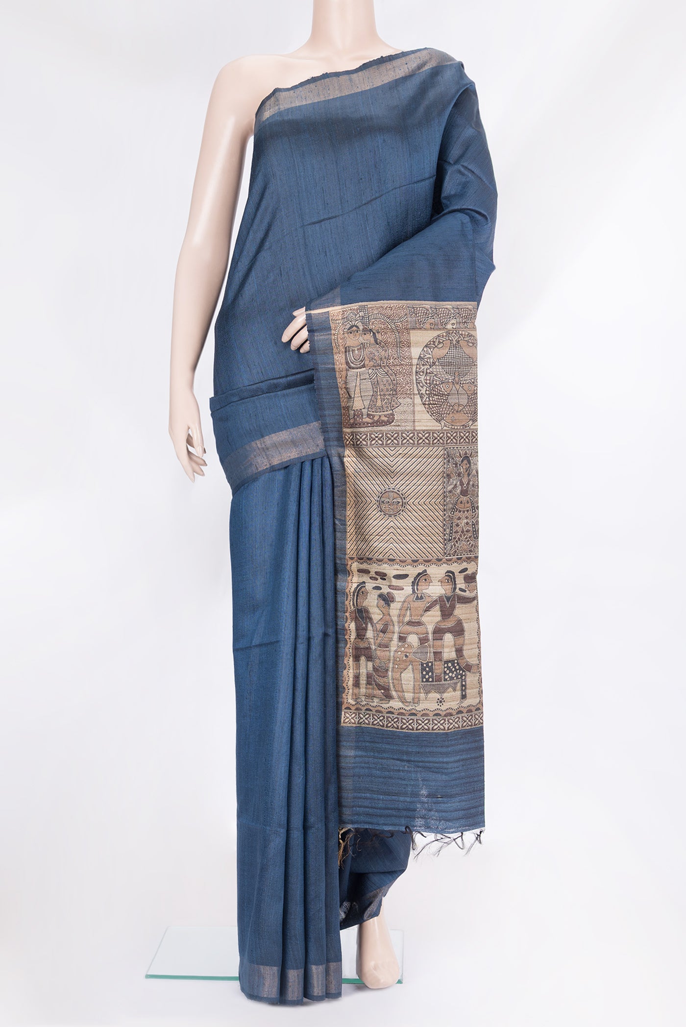 Navy Blue Tussar Silk Saree with Plain Body and Zari Border.  displayed on a mannequin
