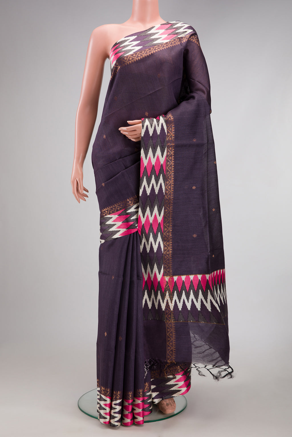 Purple Tussar Silk Saree with Zari Butta on the body and Printed Border.  displayed on a mannequin