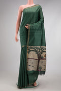 Bottle Green Tussar Silk Saree with Plain Body and Zari Border.  displayed on a mannequin
