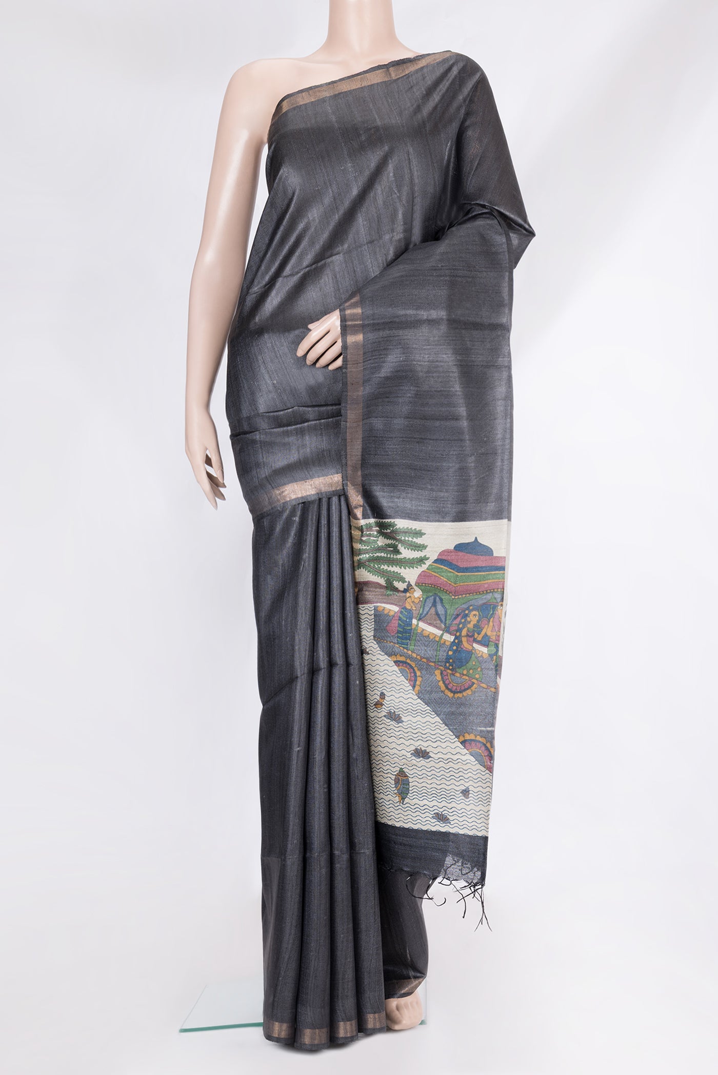 Grey Tussar Silk Saree with Plain Body and Zari Border.  displayed on a mannequin