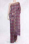 Purple Tussar Silk Saree with Printed design on the body and Plain Border.  displayed on a mannequin