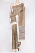 Beige Tussar Silk Saree with Printed design on the body and Fancy Border.  displayed on a mannequin