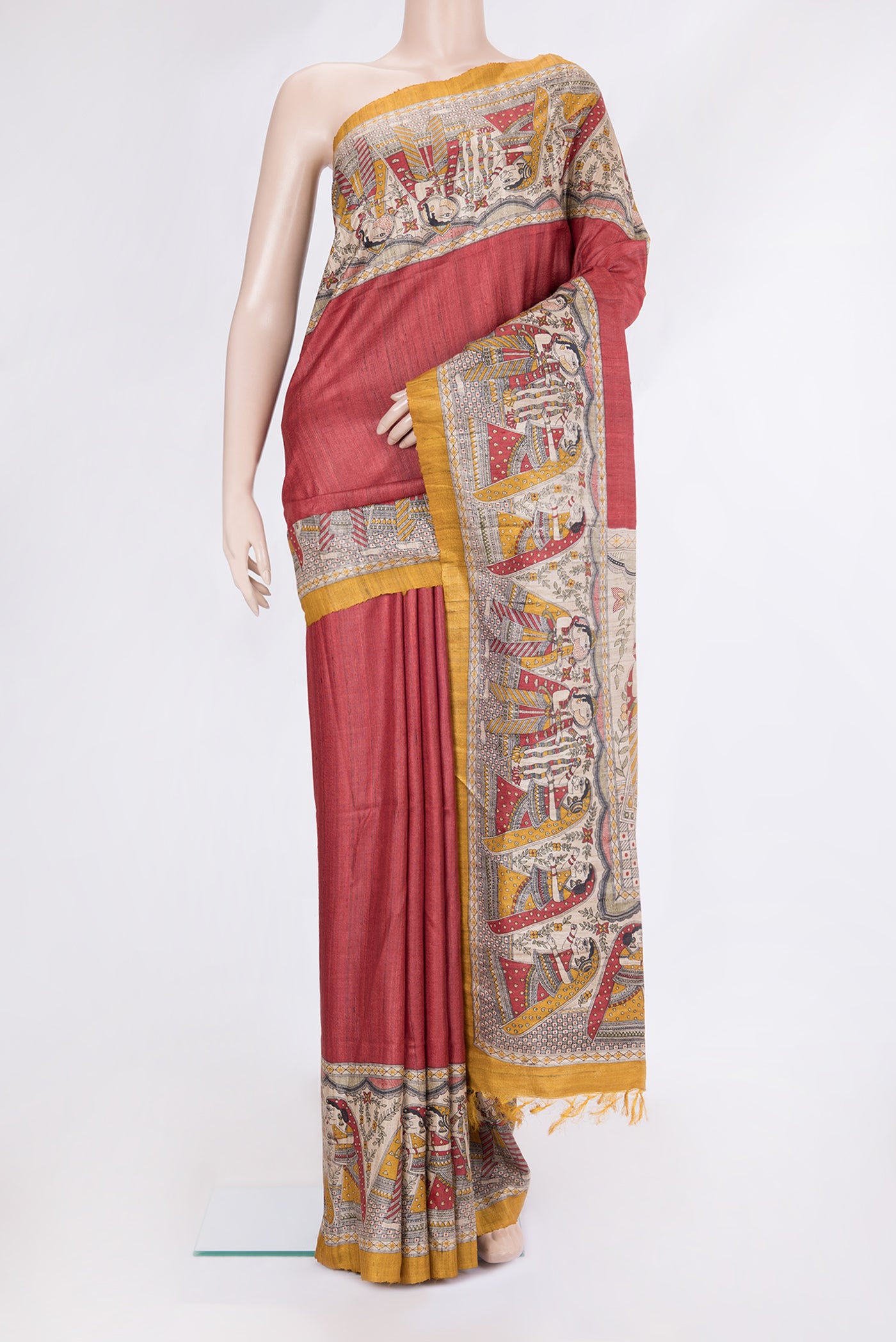 Red Tussar Silk Saree with Plain Body and Fancy Border.  displayed on a mannequin