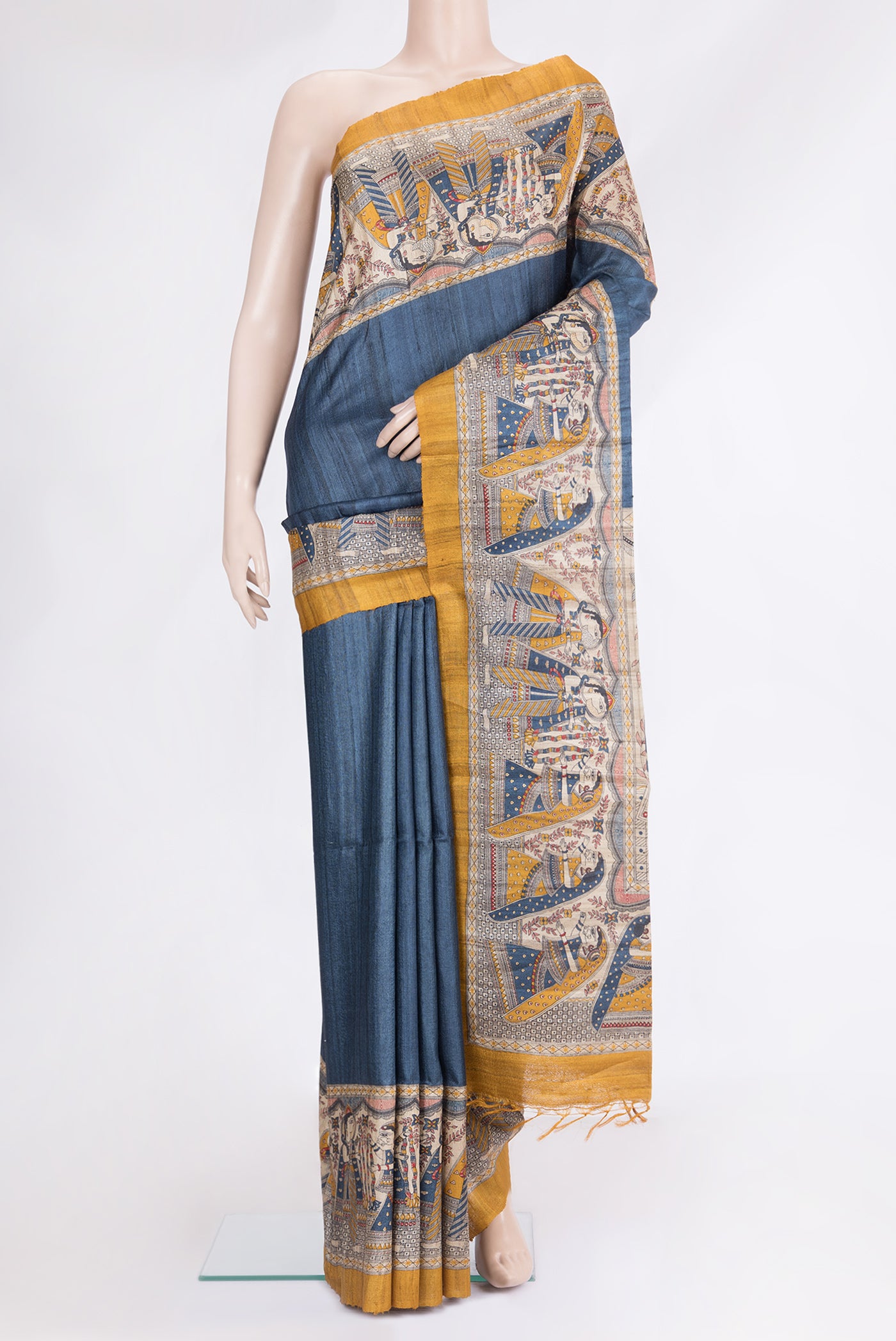 Blue Tussar Silk Saree with Plain Body and Fancy Border.  displayed on a mannequin
