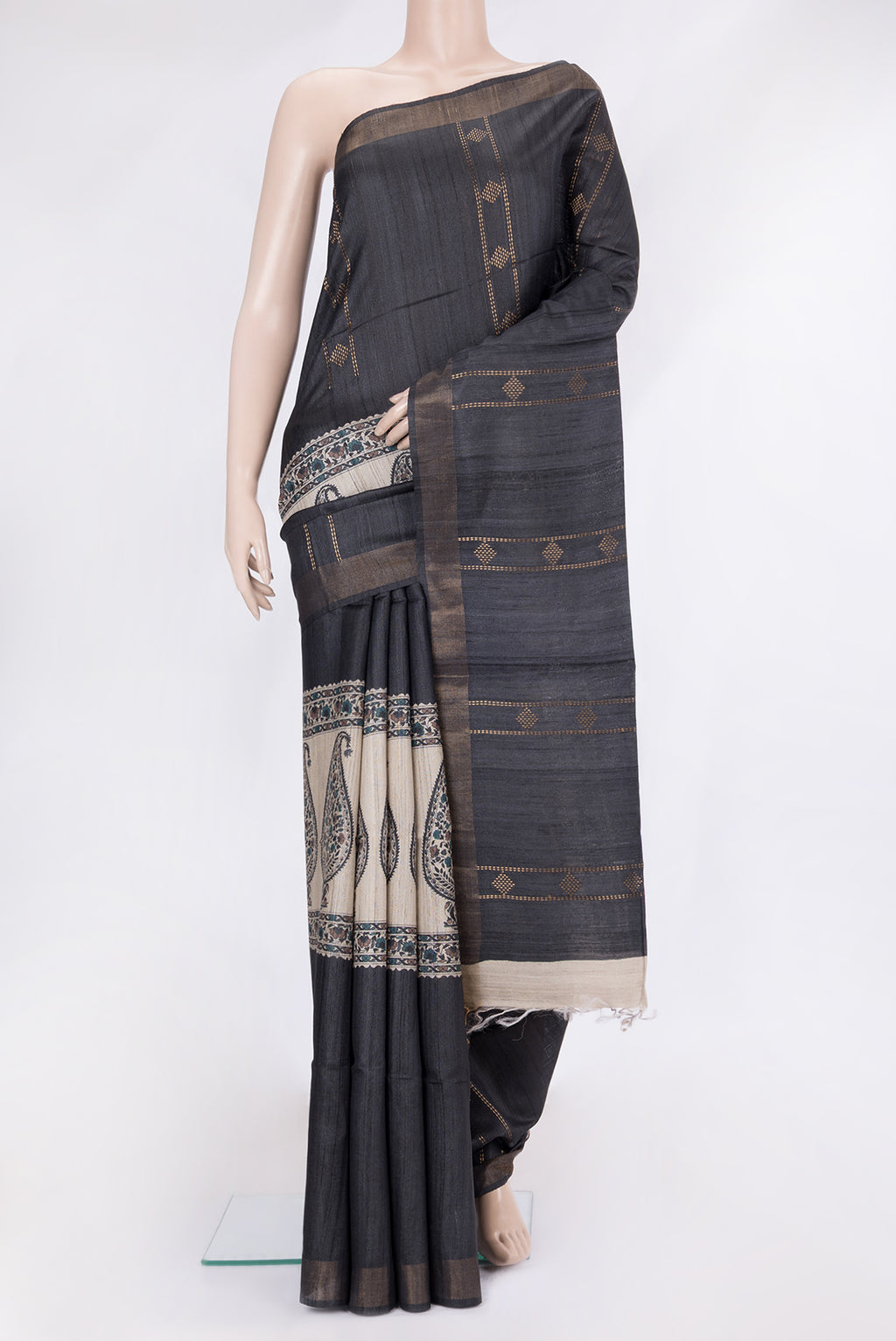 Black Tussar Silk Saree with Stripes on the body and Zari Border.  displayed on a mannequin