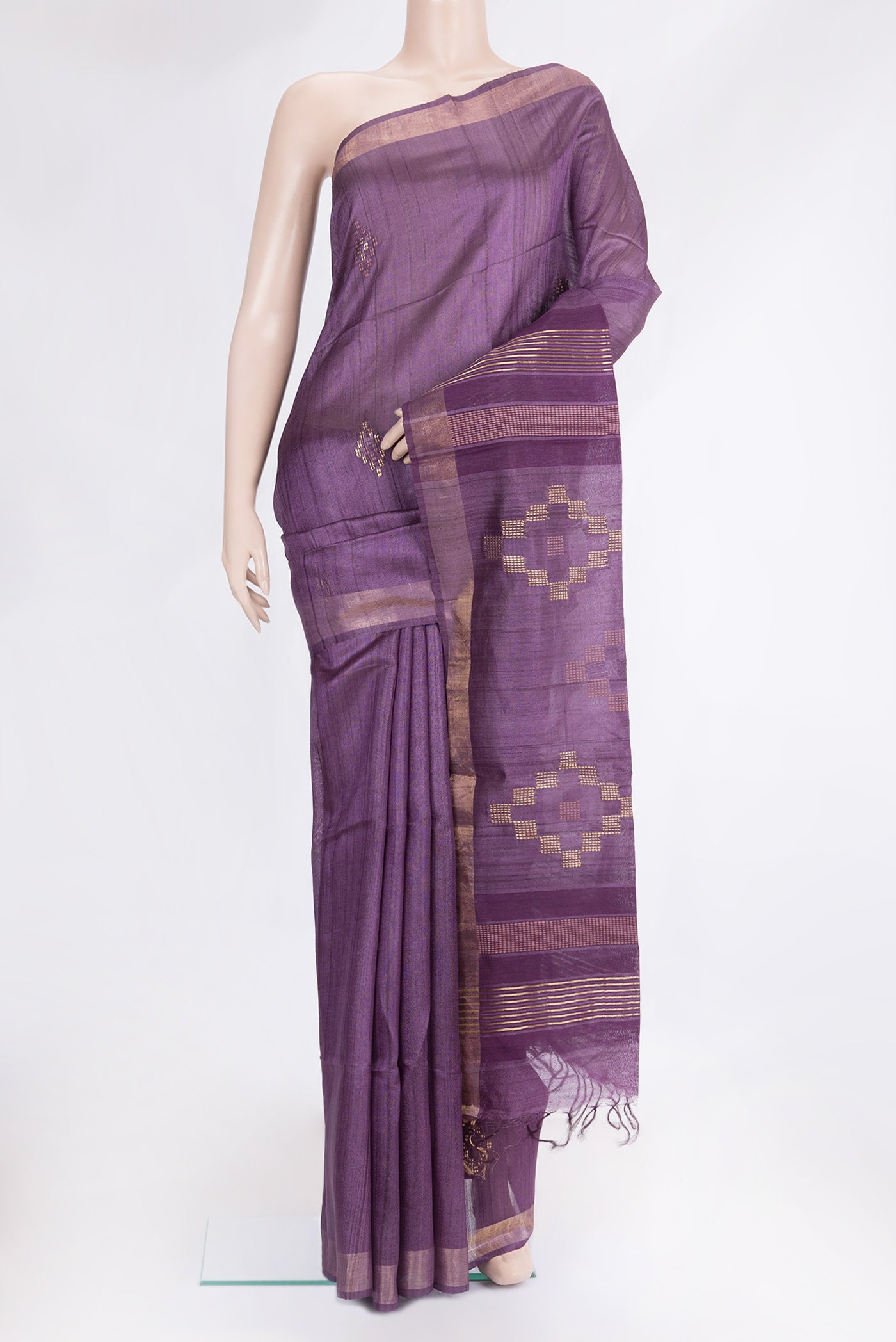 Violet Tussar Silk Saree with Zari Butta on the body and Zari Border.  displayed on a mannequin
