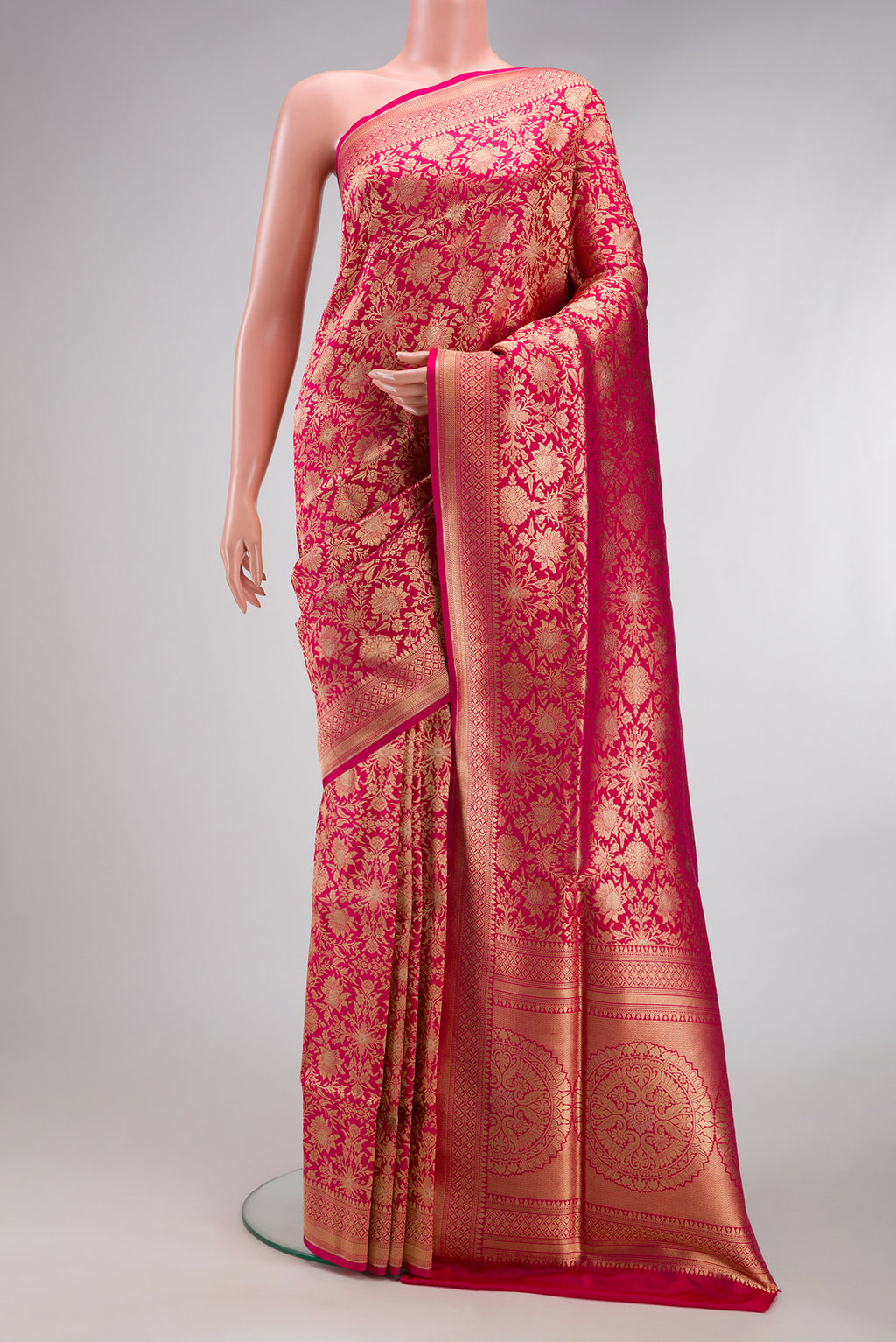 Dark Pink Dual Tone Banarasi Silk Saree with Zari Brocade on the body and Zari Border.  displayed on a mannequin