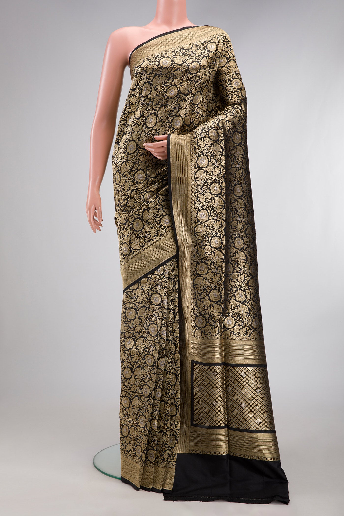 Black Banarasi Silk Saree with Zari Brocade on the body and Zari Border.  displayed on a mannequin