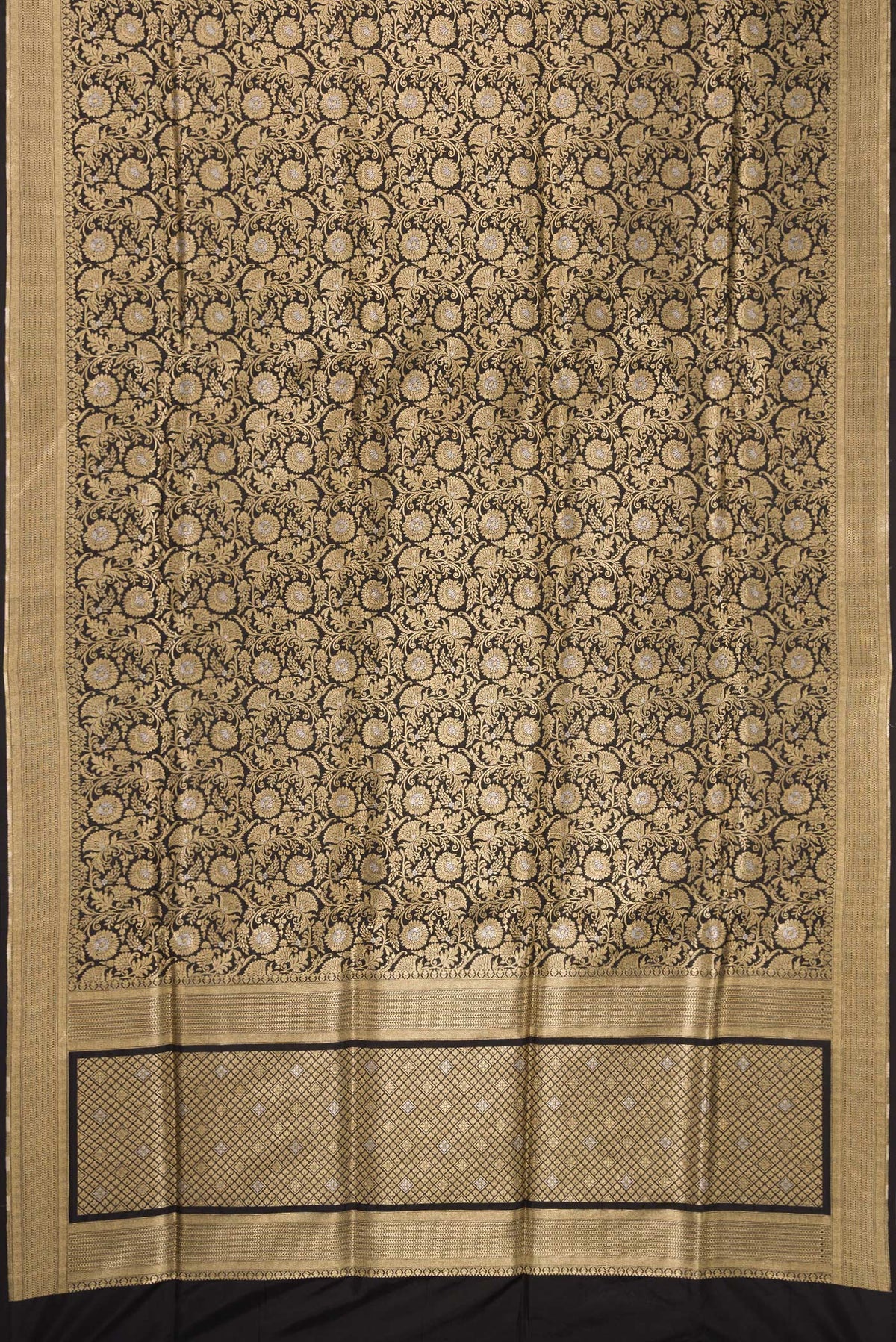 Flat view of Black Banarasi Silk Saree with Zari Brocade on the body and Zari Border. 