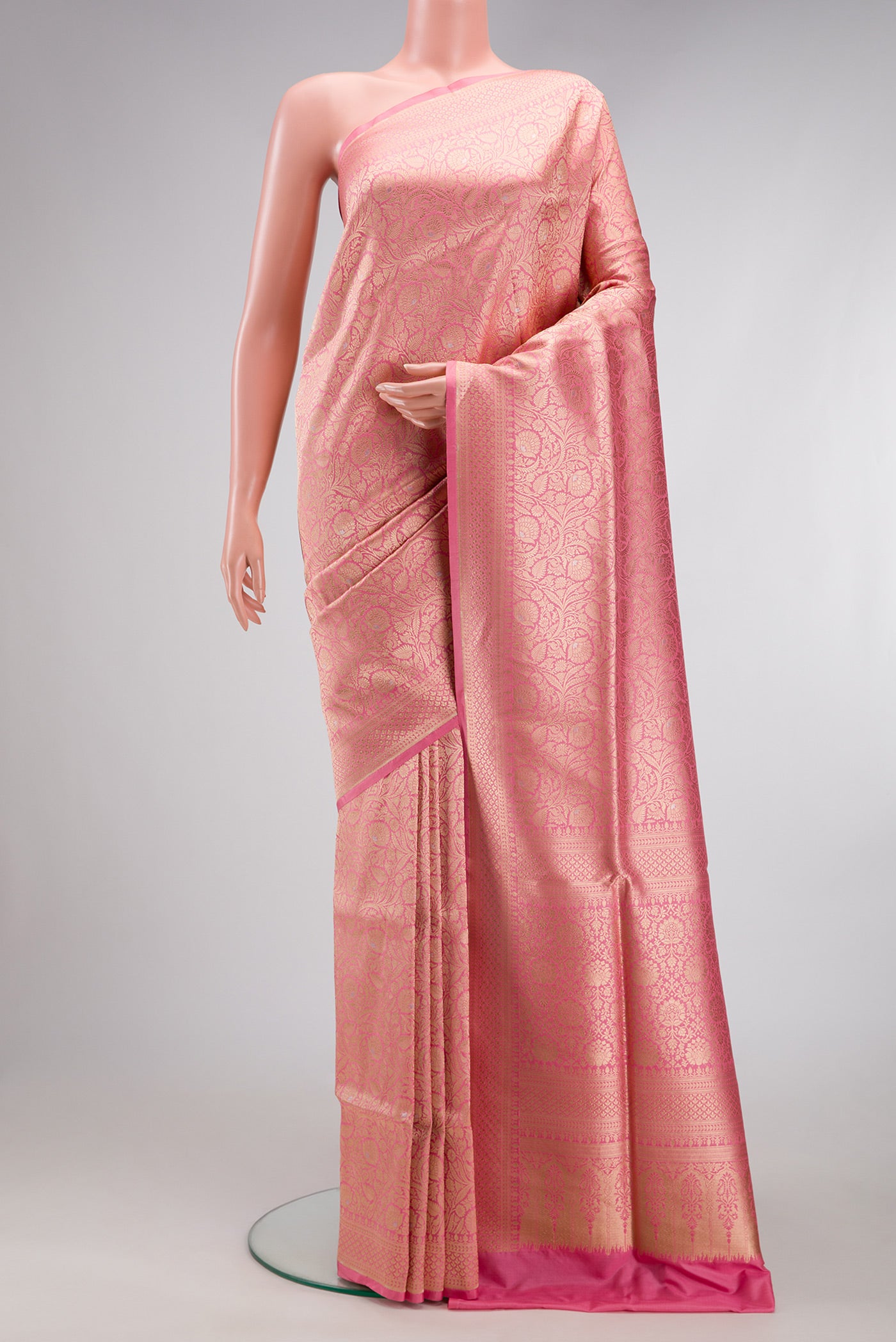 Pink Banarasi Silk Saree with Zari Brocade on the body and Zari Border.  displayed on a mannequin