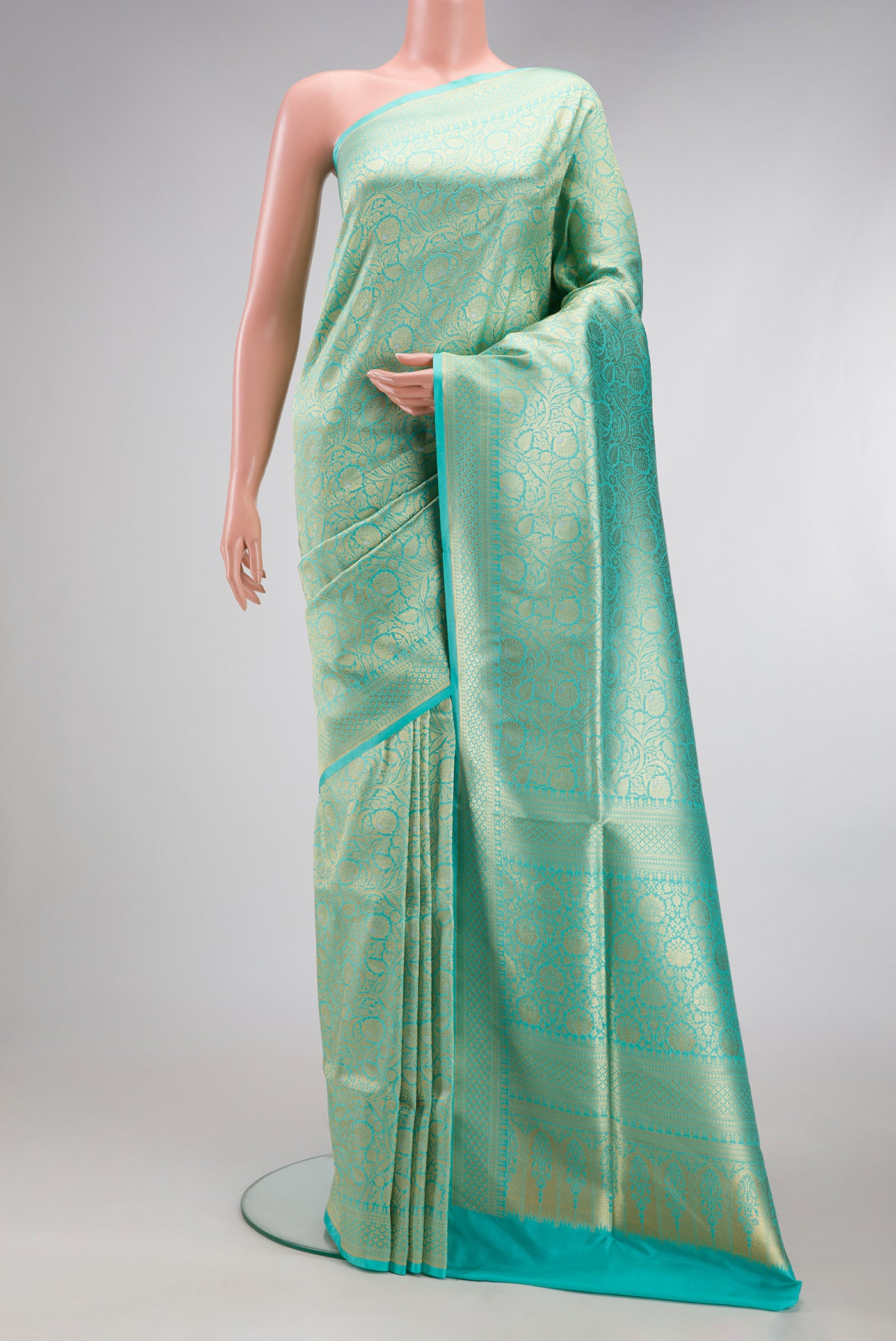 Sky Blue Banarasi Silk Saree with Zari Brocade on the body and Zari Border.  displayed on a mannequin