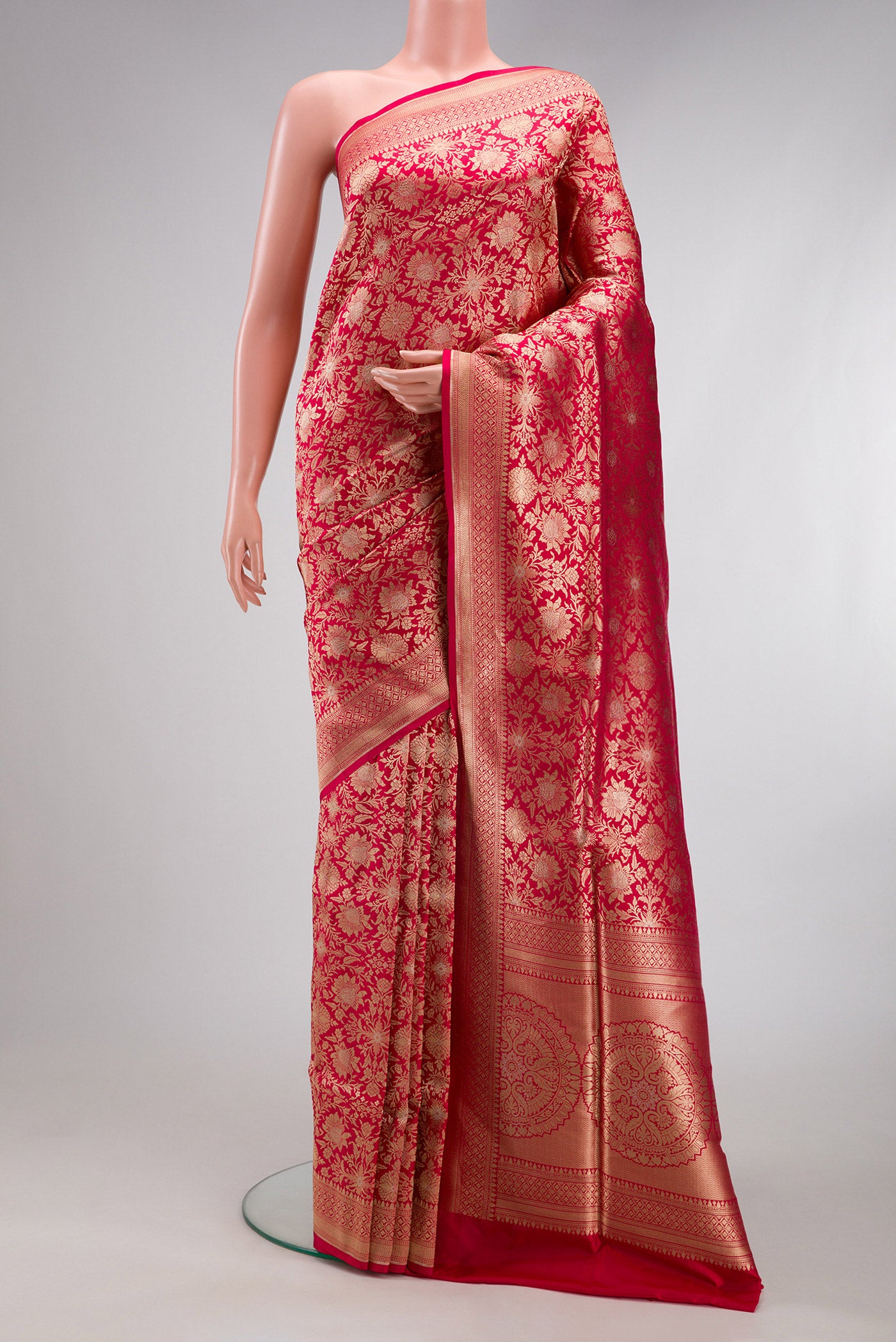 Dark Pink Banarasi Silk Saree with Zari Brocade on the body and Zari Border.  displayed on a mannequin