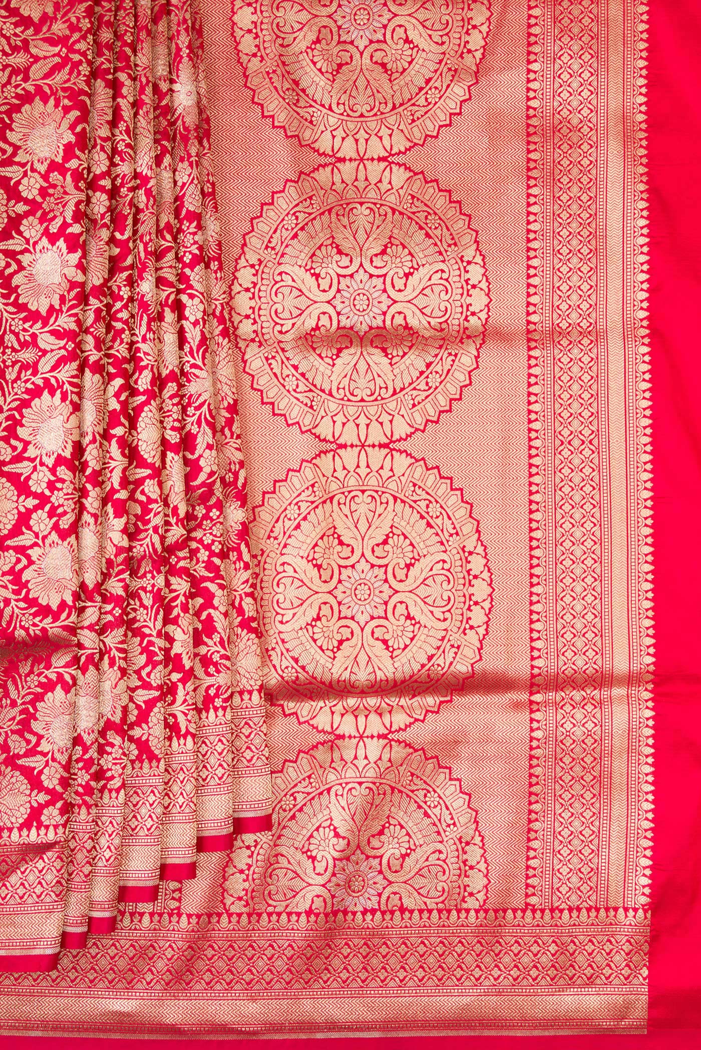 Pleats and pallu of Dark Pink Banarasi Silk Saree with Zari Brocade on the body and Zari Border. 
