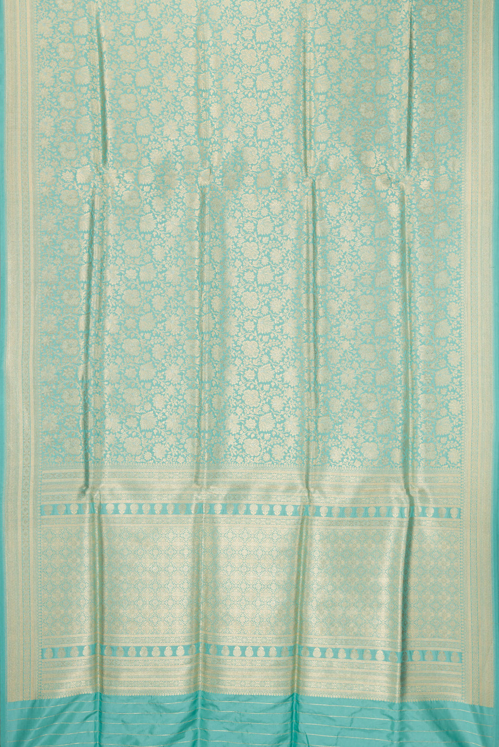 Flat view of Light Blue Banarasi Silk Saree with Zari Brocade on the body and Zari Border. 