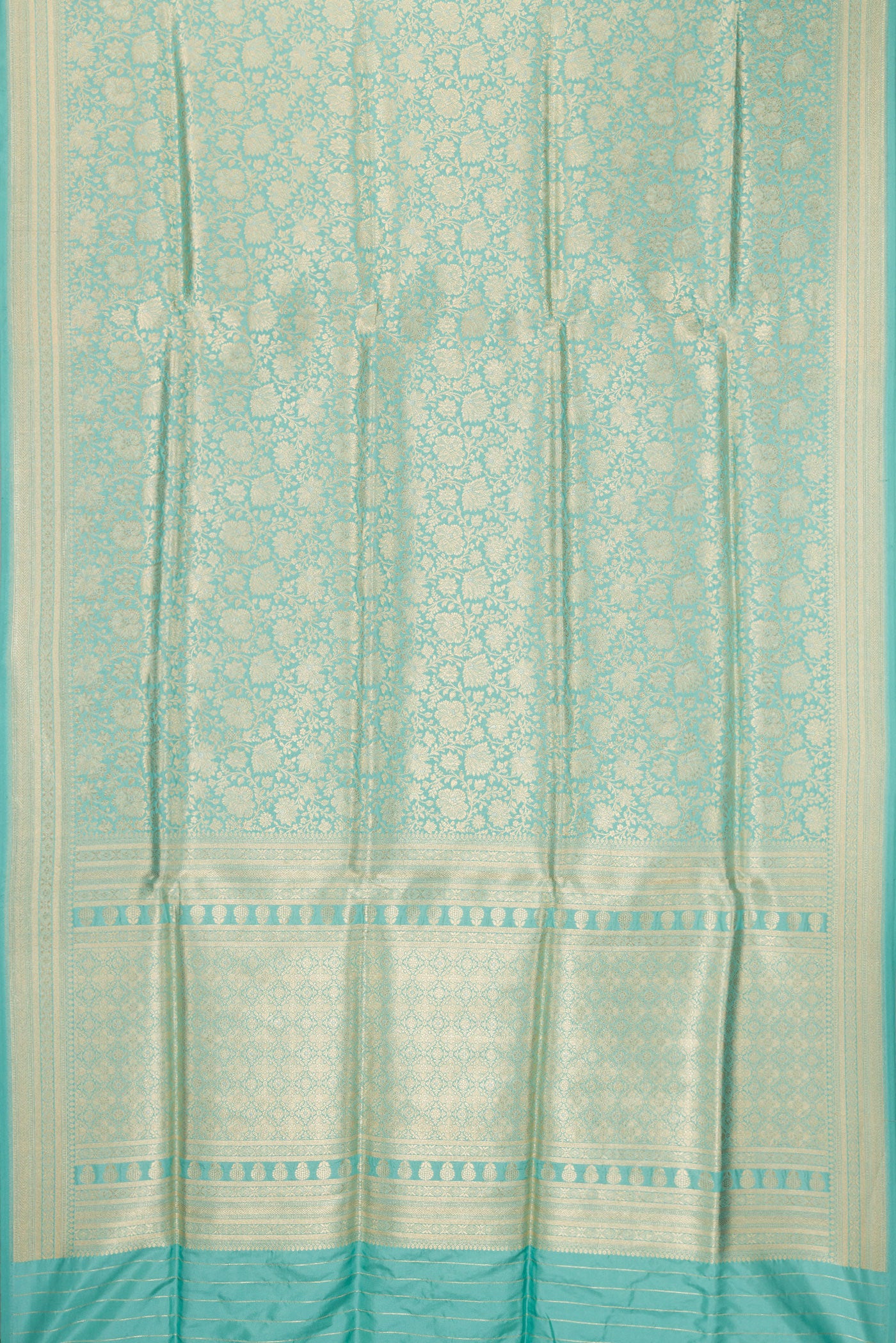 Flat view of Light Blue Banarasi Silk Saree with Zari Brocade on the body and Zari Border. 
