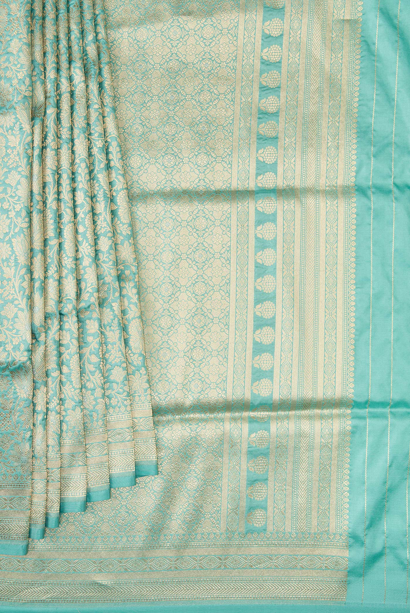 Pleats and pallu of Light Blue Banarasi Silk Saree with Zari Brocade on the body and Zari Border. 