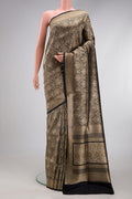 Black Banarasi Silk Saree with Zari Brocade on the body and Zari Border.  displayed on a mannequin