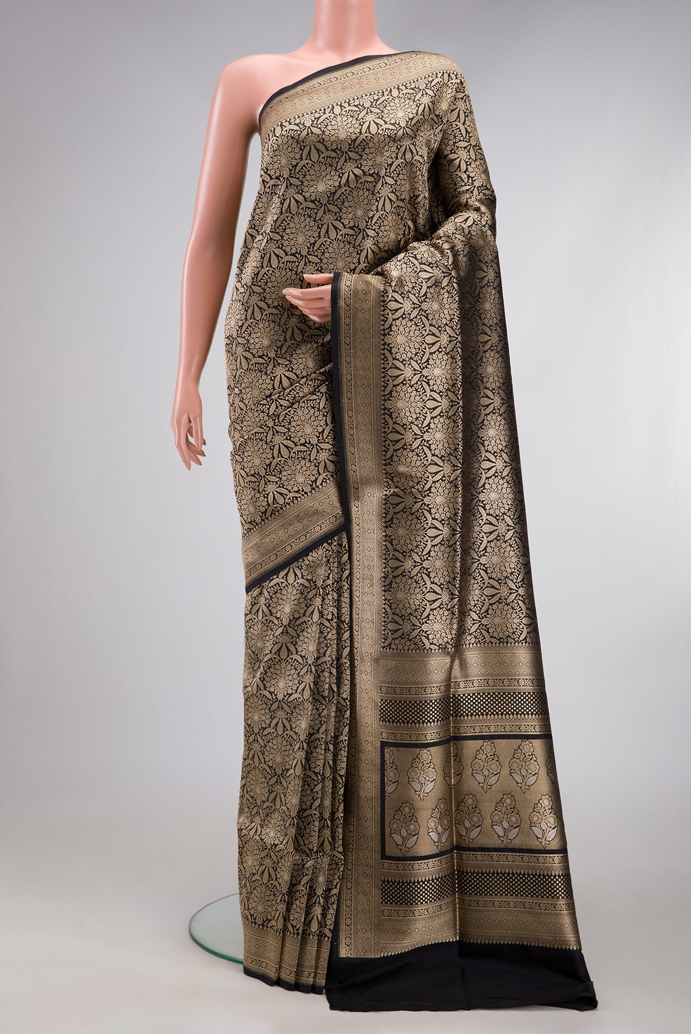 Black Banarasi Silk Saree with Zari Brocade on the body and Zari Border.  displayed on a mannequin