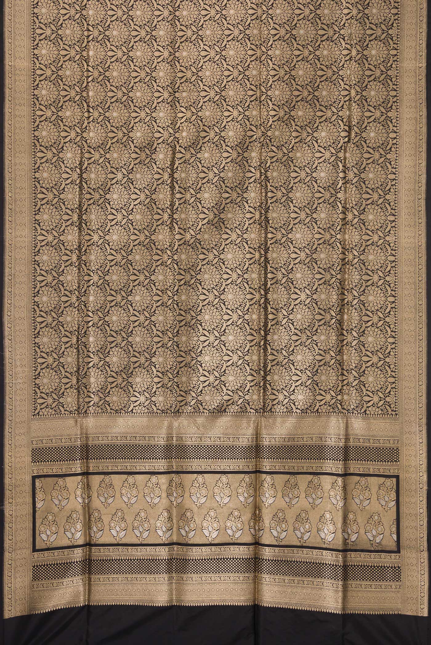 Flat view of Black Banarasi Silk Saree with Zari Brocade on the body and Zari Border. 