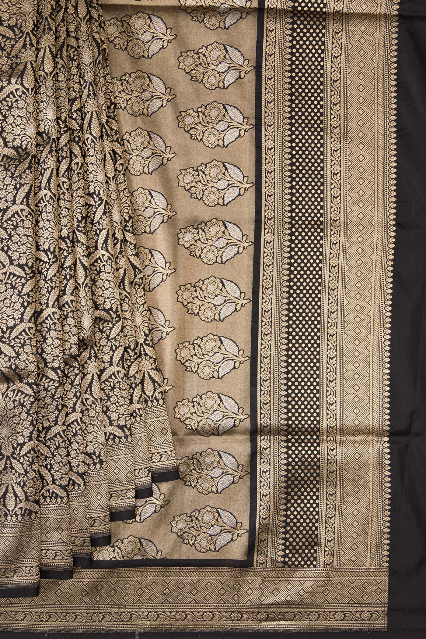 Pleats and pallu of Black Banarasi Silk Saree with Zari Brocade on the body and Zari Border. 