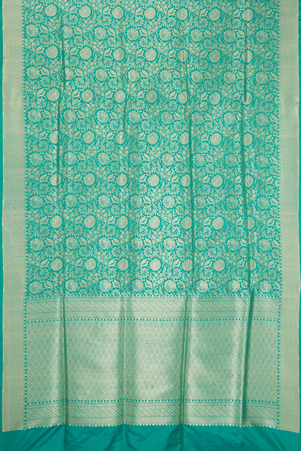 Flat view of Sea Green Banarasi Silk Saree with Zari Brocade on the body and Zari Border. 