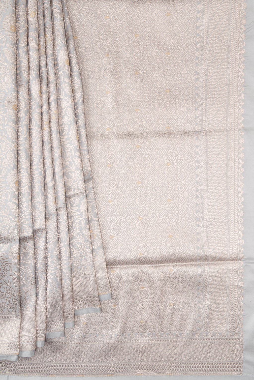 Pleats and pallu of Grey Banarasi Silk Saree with Zari Brocade on the body and Zari Border. 