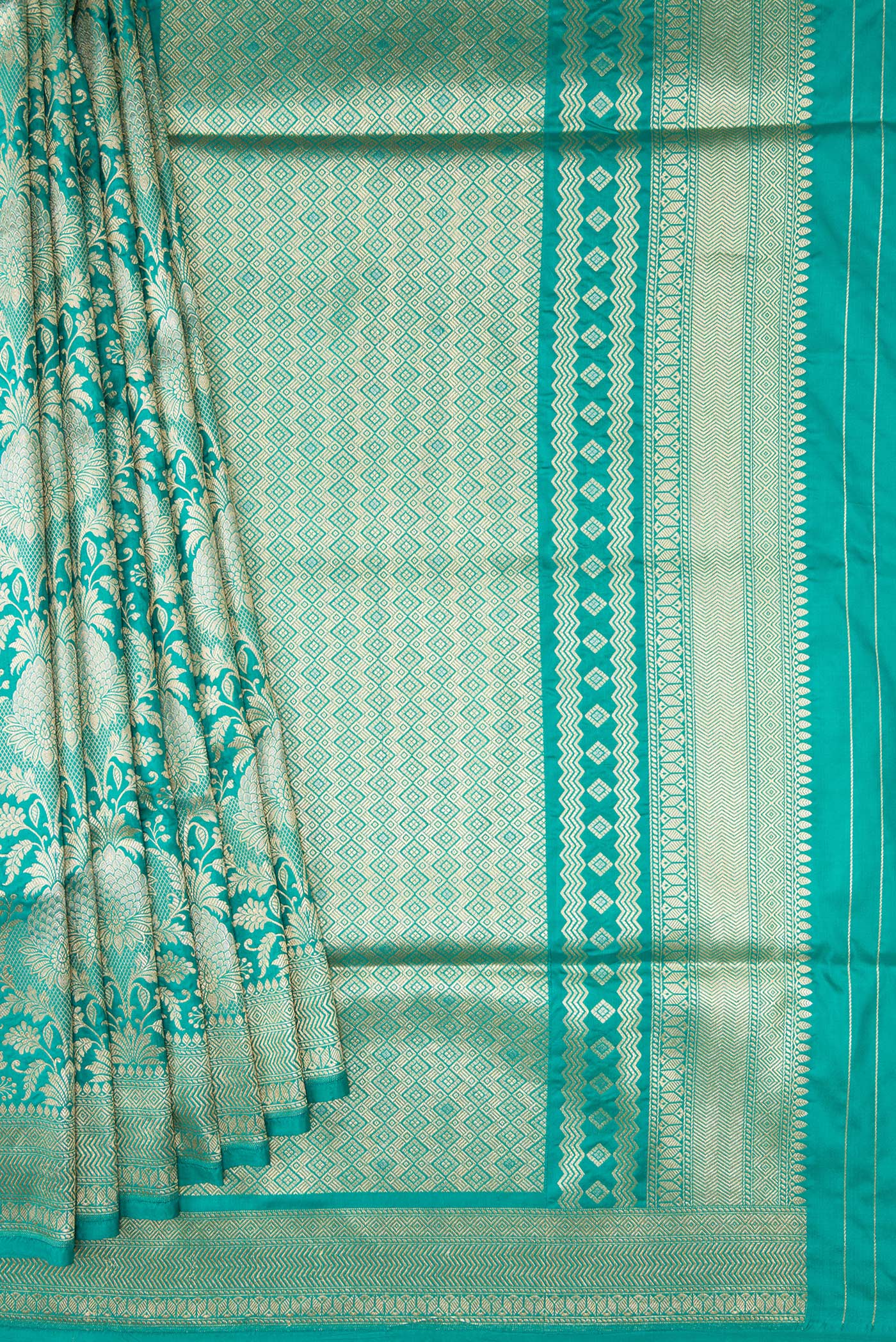 Pleats and pallu of Turquoise Banarasi Silk Saree with Zari Brocade on the body and Zari Border. 