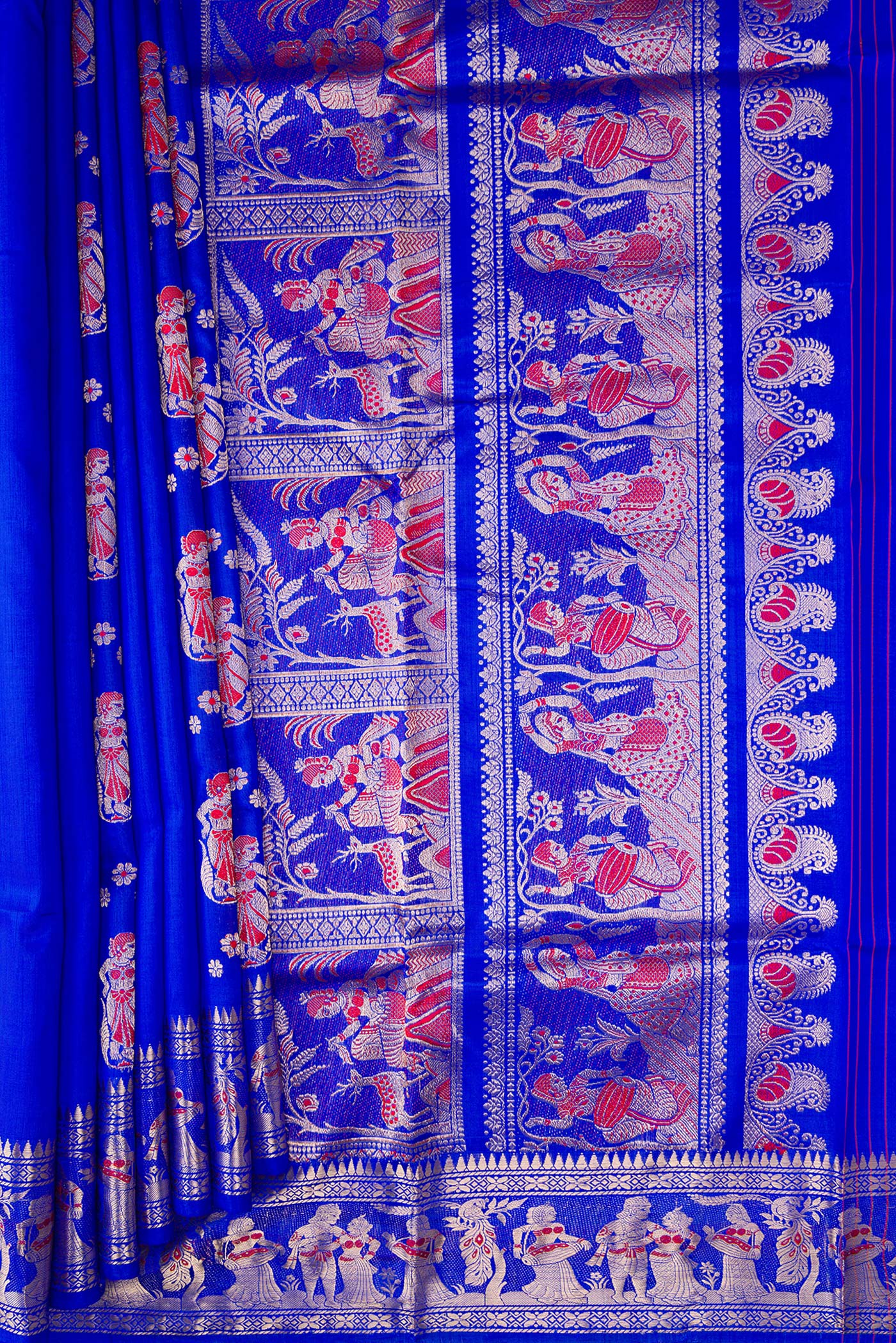 Pleats and pallu of Royal Blue Baluchari Silk Saree with Zari And Thread Butta on the body and Zari And Thread Border. 