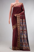 Coffee Brown Baluchari Silk Saree with Zari And Thread Butta on the body and Zari Border.  displayed on a mannequin