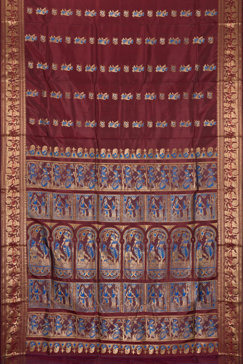 Flat view of Coffee Brown Baluchari Silk Saree with Zari And Thread Butta on the body and Zari Border. 
