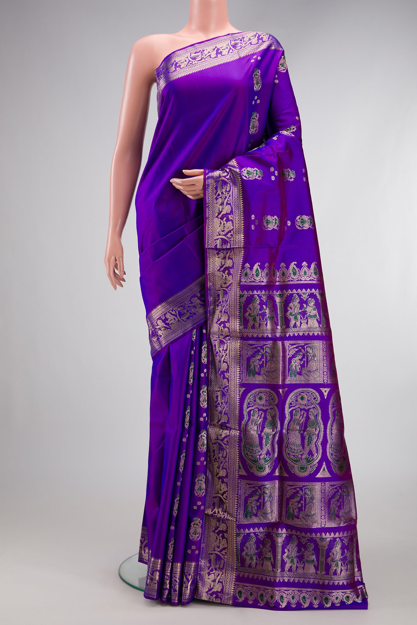 Purple Dual Tone Baluchari Silk Saree with Zari And Thread Butta on the body and Zari Border.  displayed on a mannequin