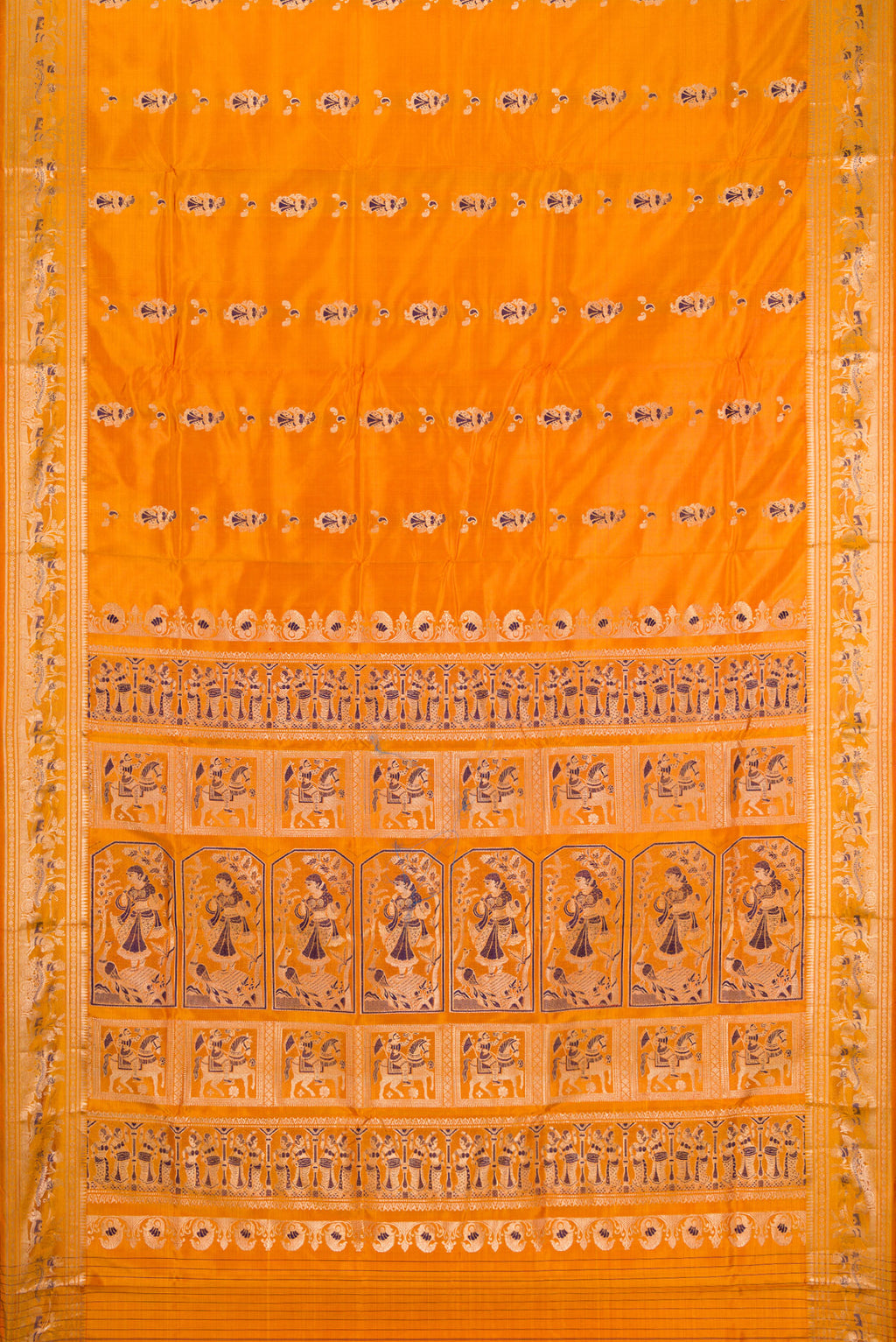 Flat view of Mustard Baluchari Silk Saree with Zari And Thread Butta on the body and Zari Border. 