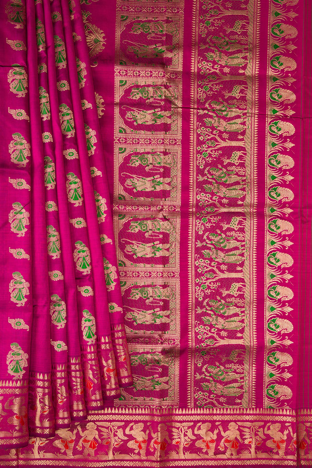 Pleats and pallu of Magenta Baluchari Silk Saree with Zari And Thread Butta on the body and Zari Border. 