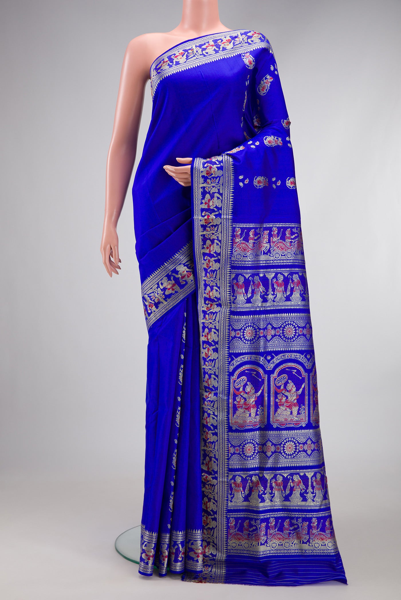 Royal Blue Dual Tone Baluchari Silk Saree with Thread Butta on the body and Thread Border.  displayed on a mannequin