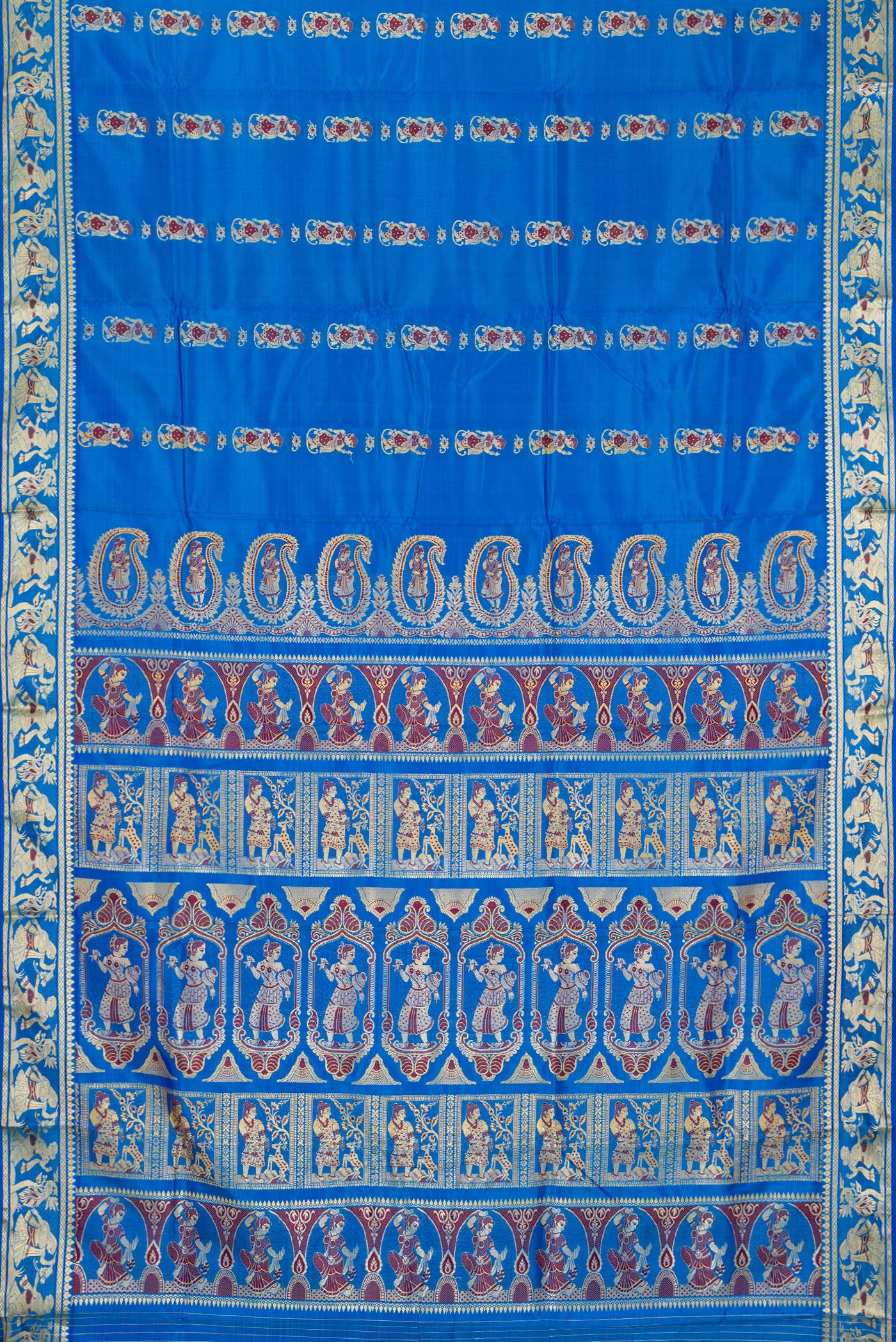 Flat view of Royal Blue Baluchari Silk Saree with Thread Butta on the body and Thread Border. 