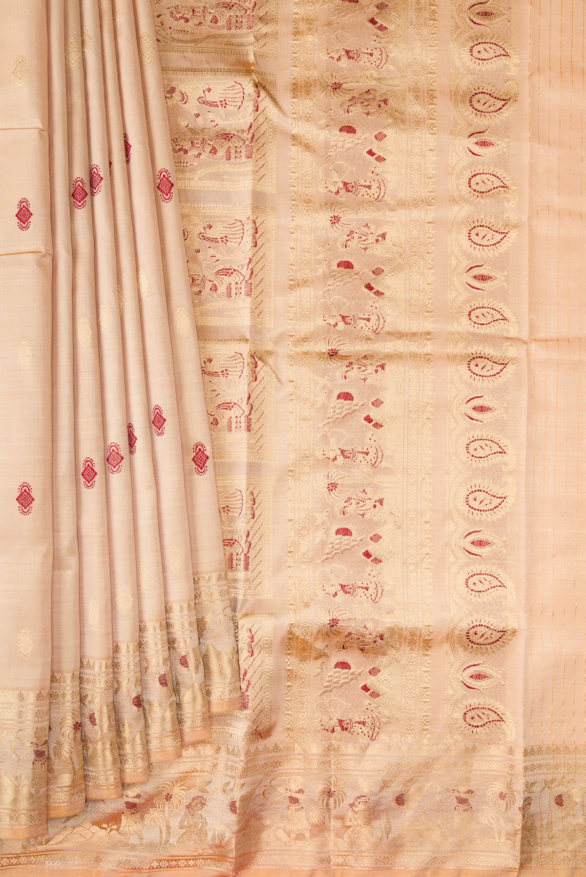 Pleats and pallu of Beige Baluchari Silk Saree with Zari And Thread Butta on the body and Zari And Thread Border. 
