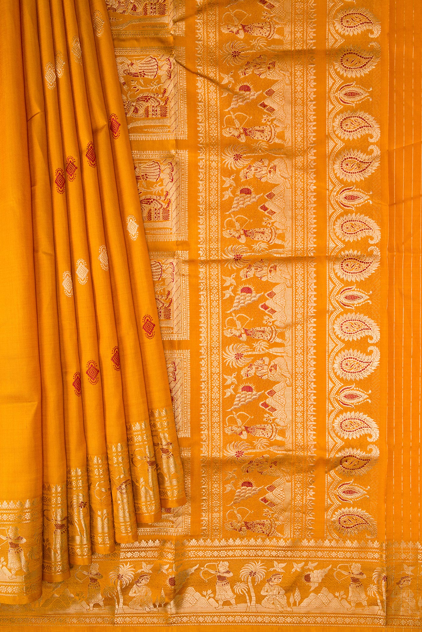 Pleats and pallu of Mustard Baluchari Silk Saree with Zari And Thread Butta on the body and Zari And Thread Border. 