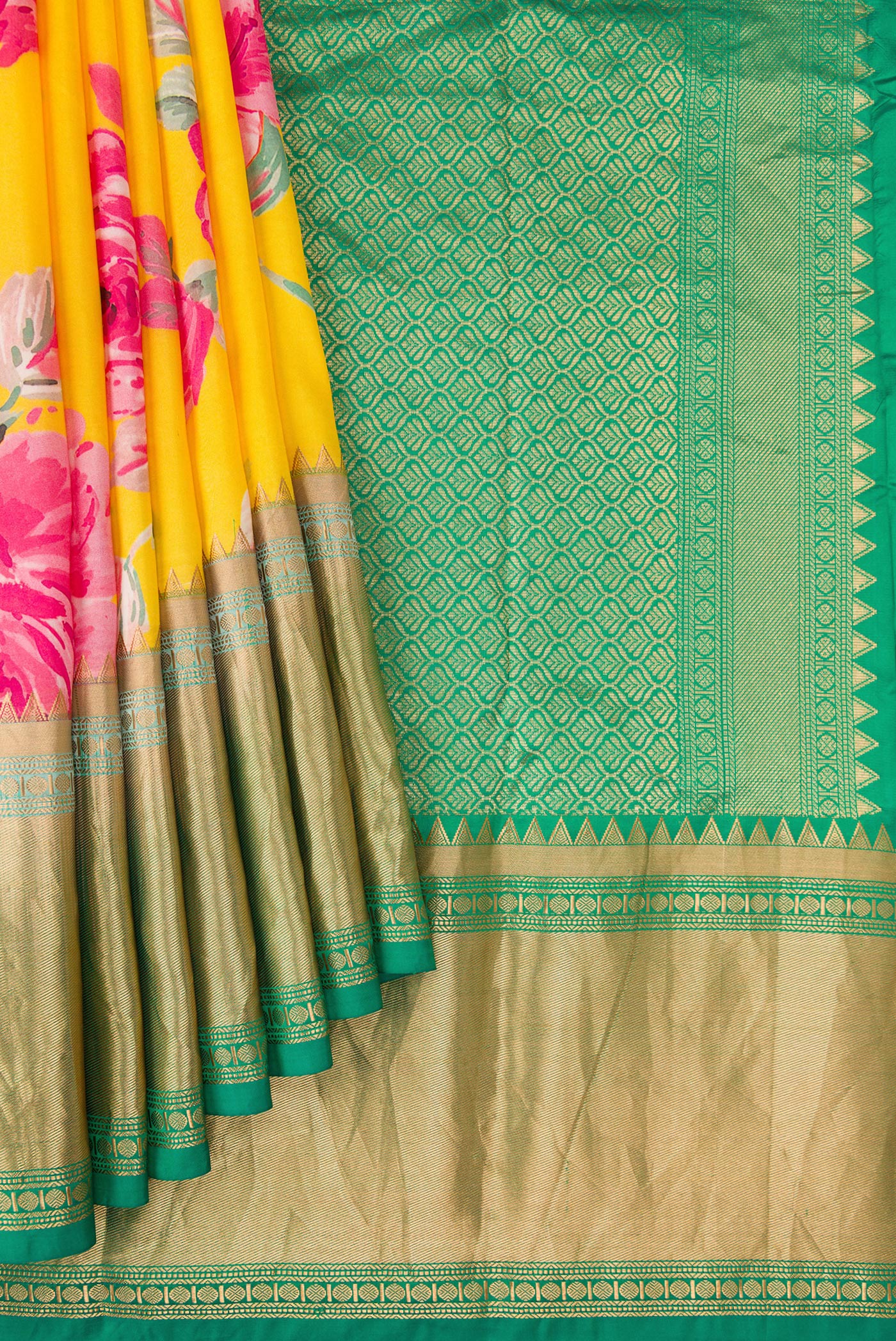 Pleats and pallu of Yellow Dual Tone Kanjivaram Silk Saree with Floral Print on the body and Zari Border. 