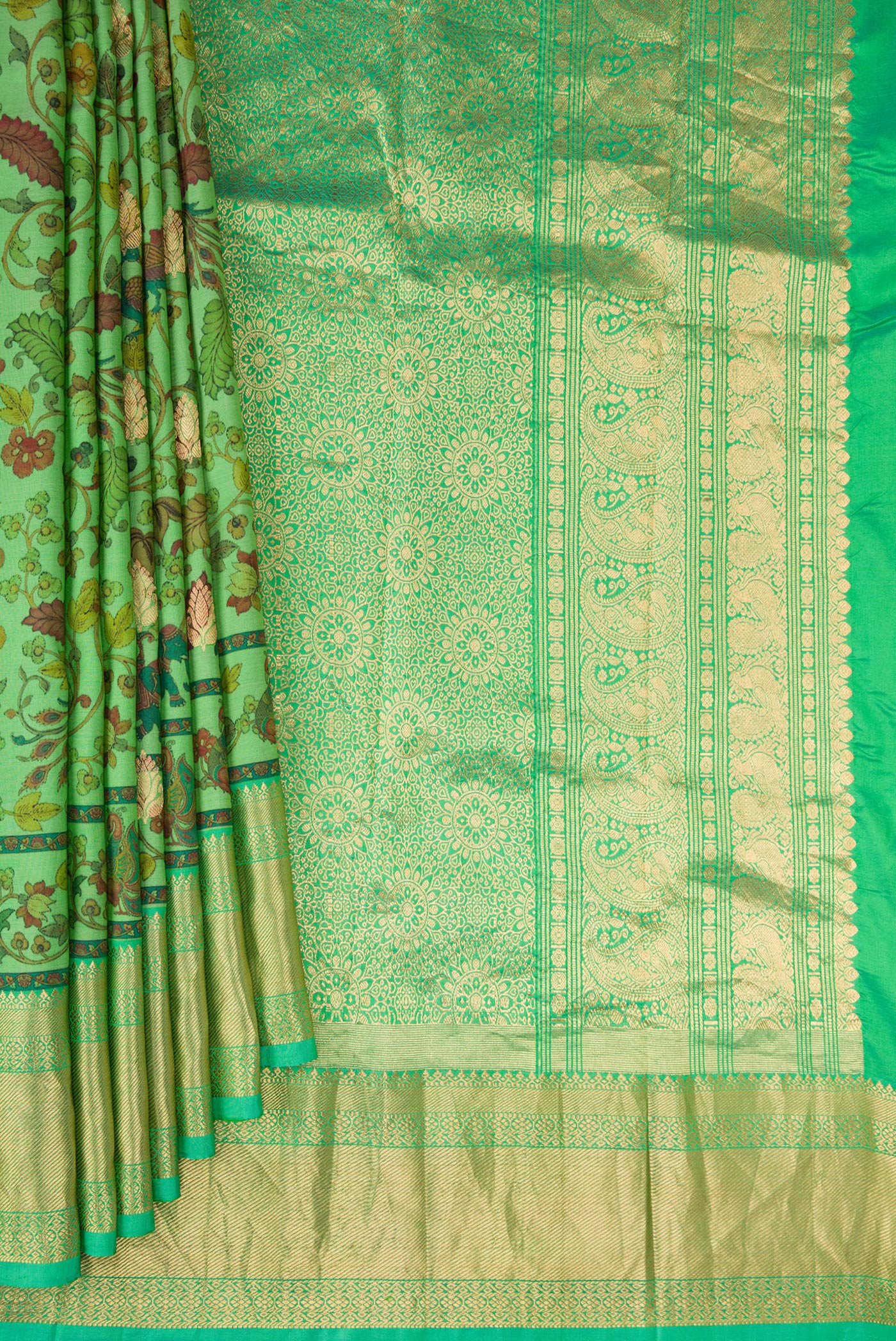Pleats and pallu of Green Kanjivaram Silk Saree with Floral Print on the body and Zari Border. 