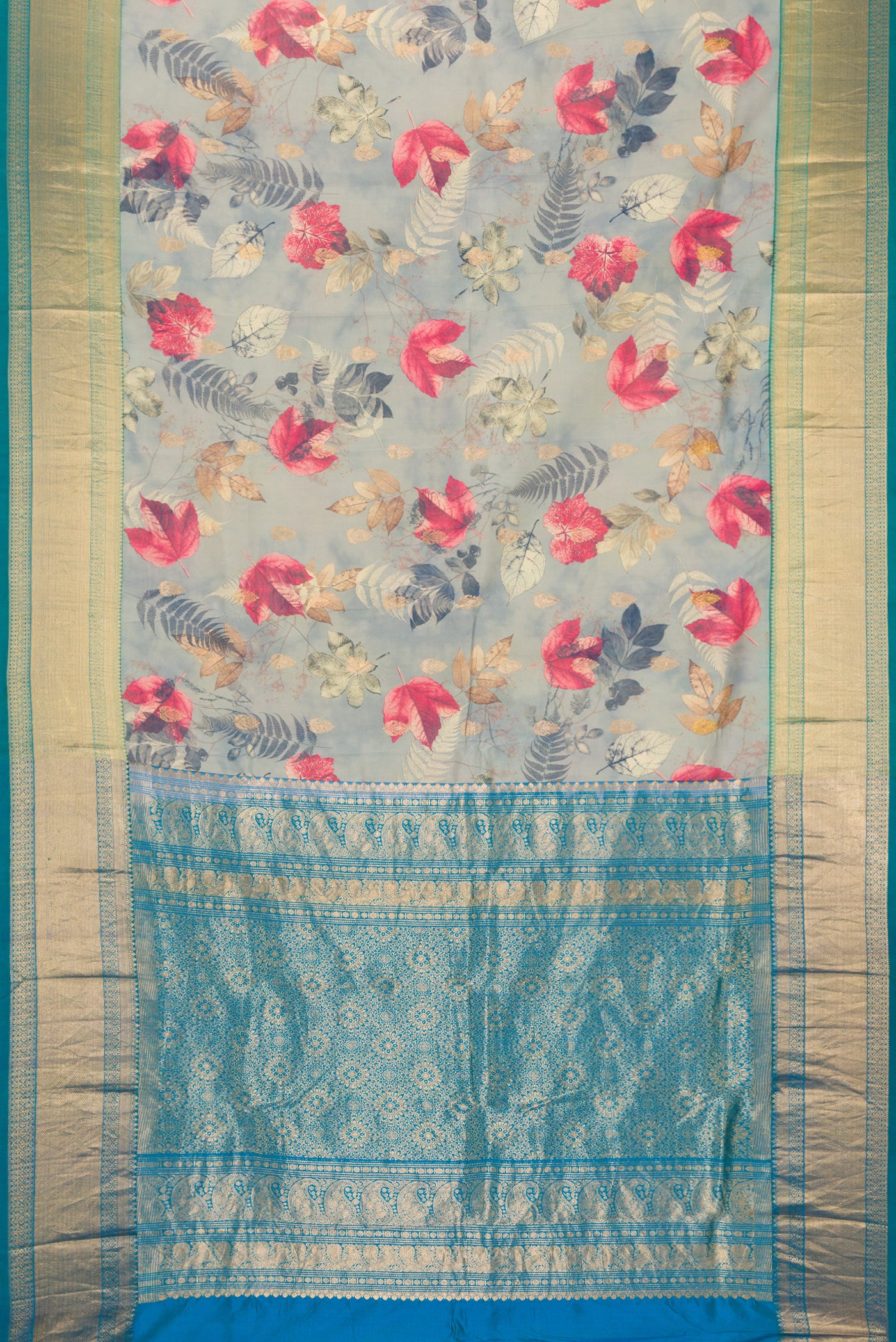 Flat view of Grey Kanjivaram Silk Saree with Floral Print on the body and Zari Border. 