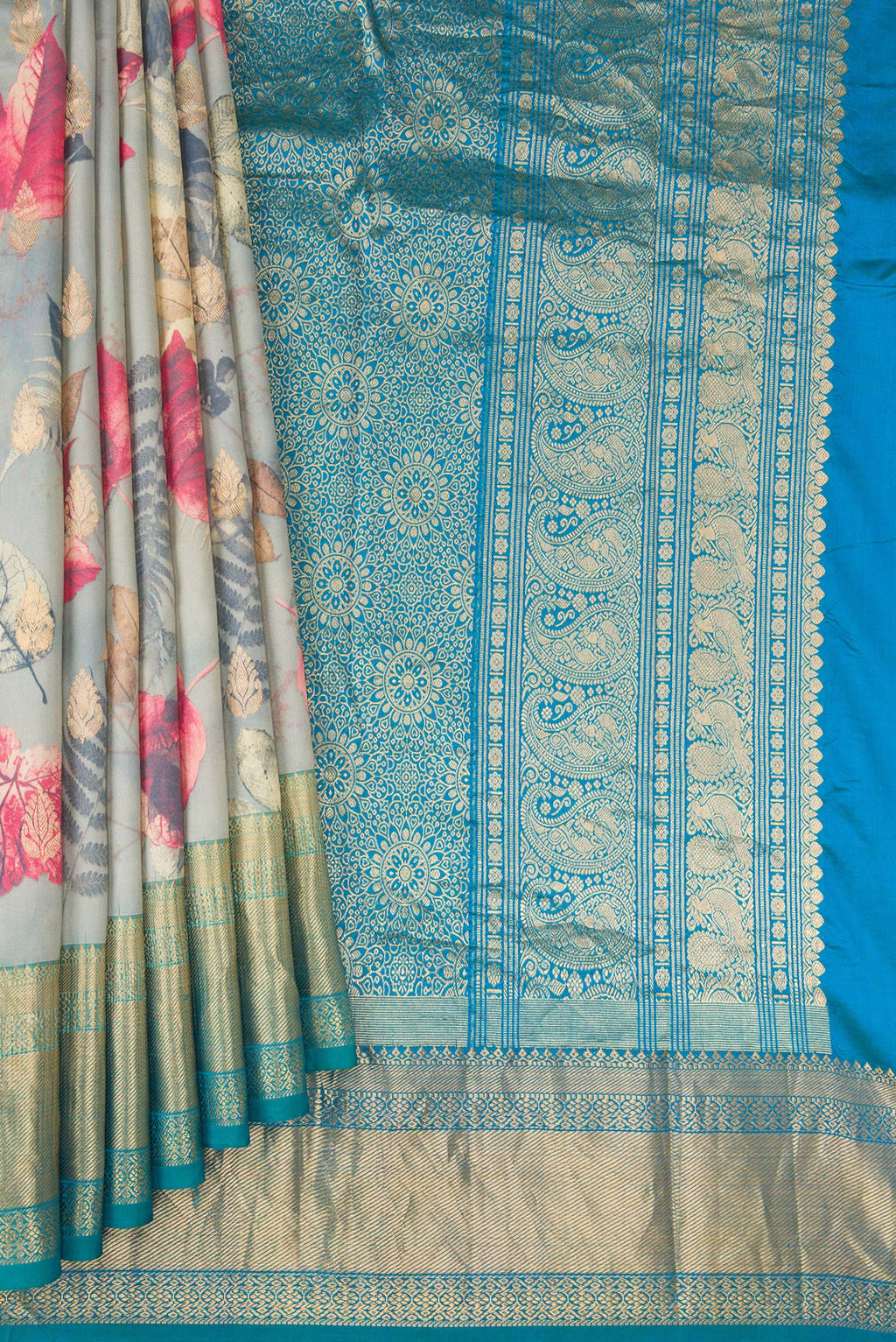Pleats and pallu of Grey Kanjivaram Silk Saree with Floral Print on the body and Zari Border. 