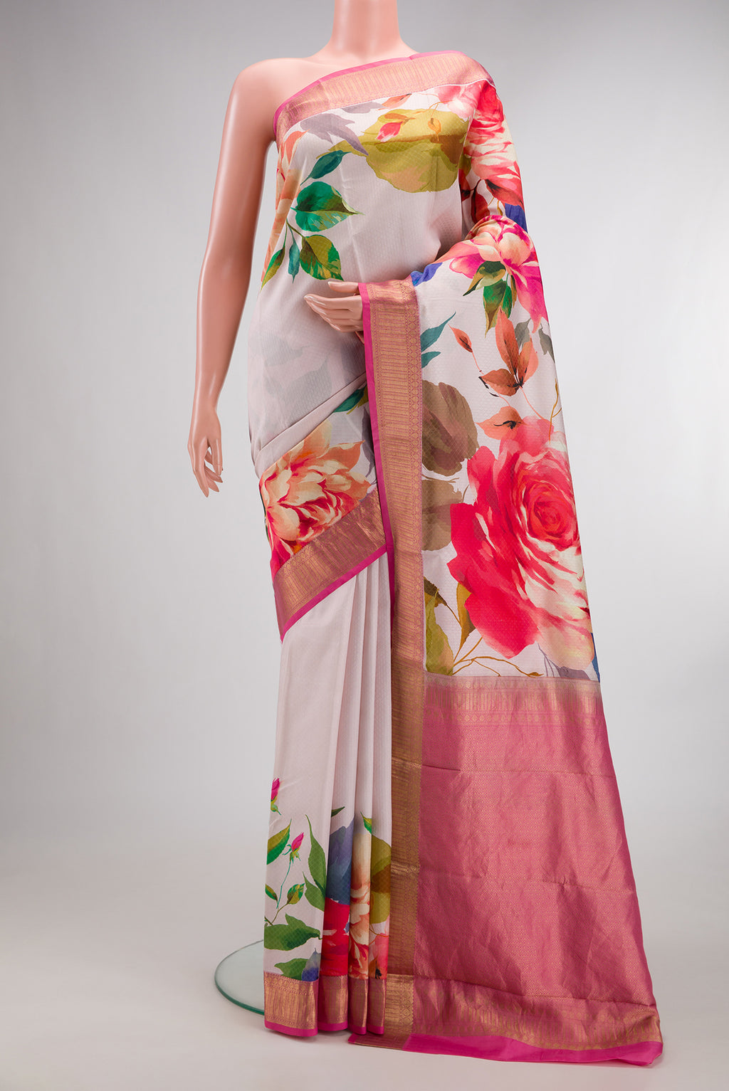 Pure Silk Cream Kanchipuram Saree with Floral Print on the body and Zari Border.  displayed on a mannequin