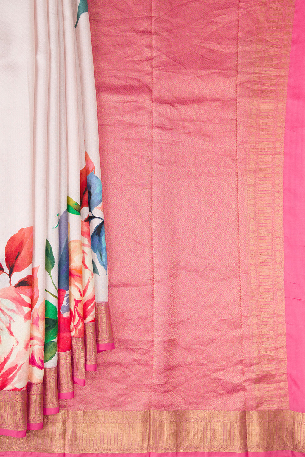 Pleats and pallu of Pure Silk Cream Kanchipuram Saree with Floral Print on the body and Zari Border. 