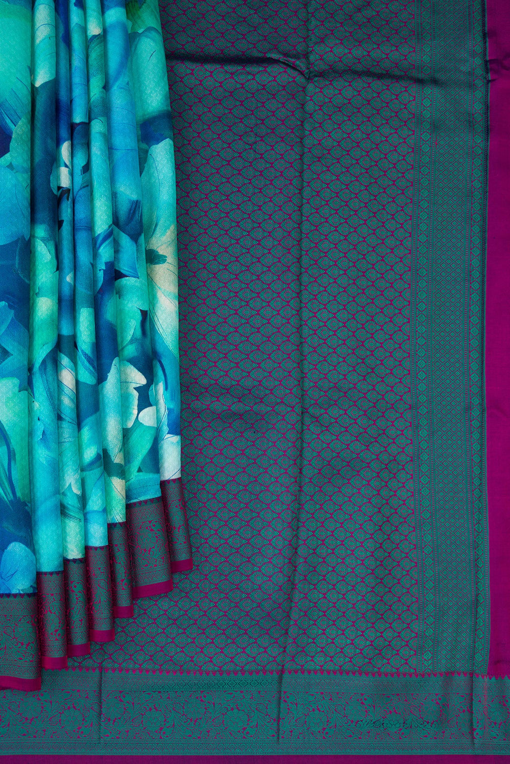 Pleats and pallu of Sky Blue Kanchipuram Silk Saree with Floral Print on the body and Thread Border. 