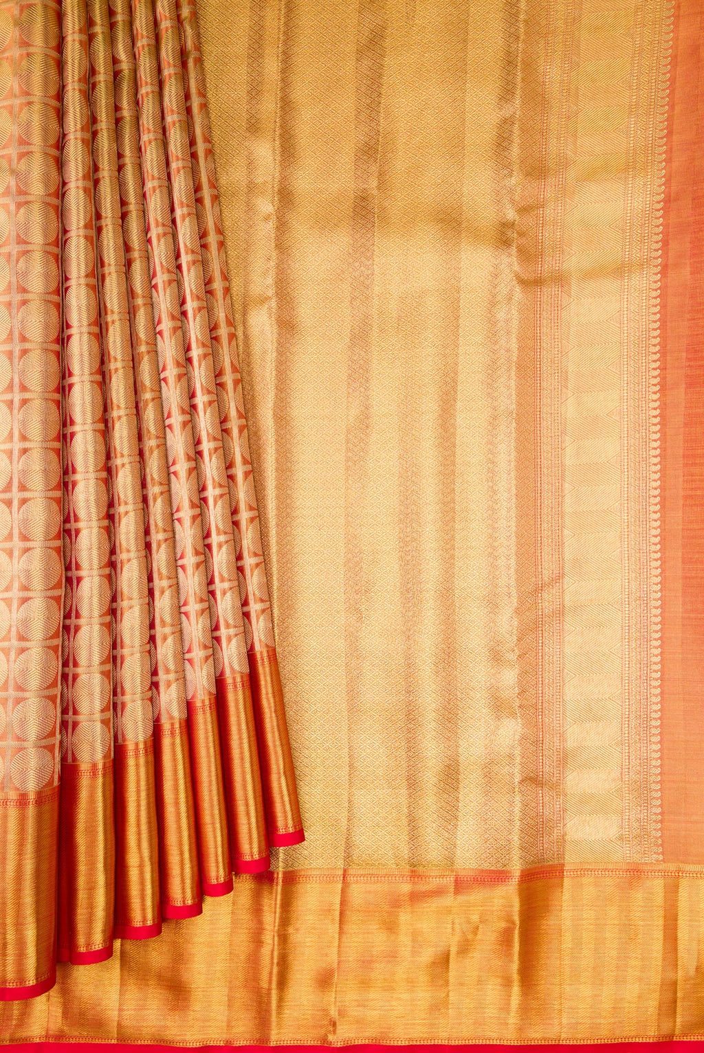 Pleats and pallu of Gold Dual Tone Kanchipuram Tissue Silk Saree with Zari Brocade on the body and Zari Border. 
