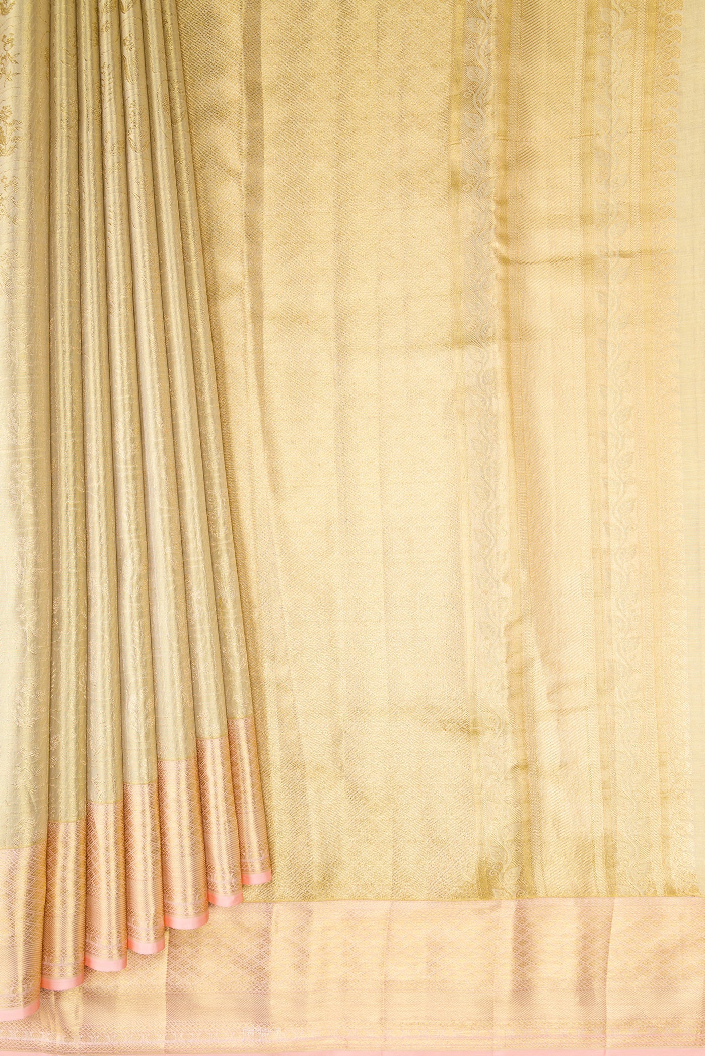 Pleats and pallu of Gold Dual Tone Kanchipuram Tissue Silk Saree with Zari Brocade on the body and Zari Border. 